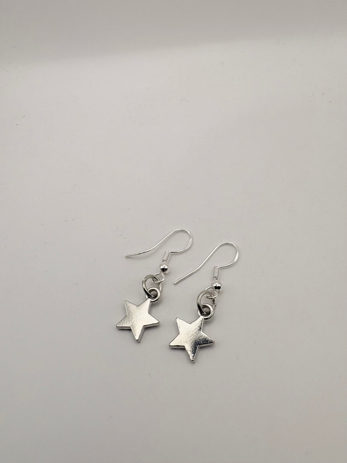 Silver start earrings